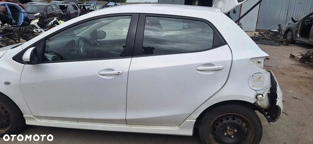 MAZDA 2 II DE 1,6CITD 90KM wtryskiwacz wtrysk - 7