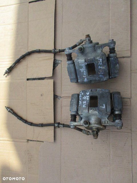 MAZDA 2 DJ ZACISK HAMULCOWY PRAWY LEWY PRZÓD 2017 - 1