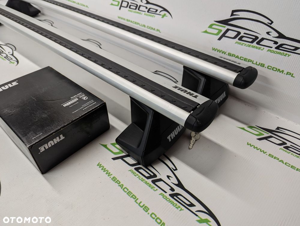Bagażnik dachowy Thule: belki 711500 + Stopy 7105 + kit - 1