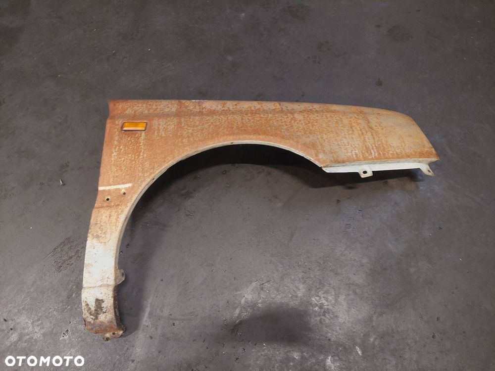 BŁOTNIK PRAWY PRZÓD VOLKSWAGEN GOLF III ROST STYLE - 1