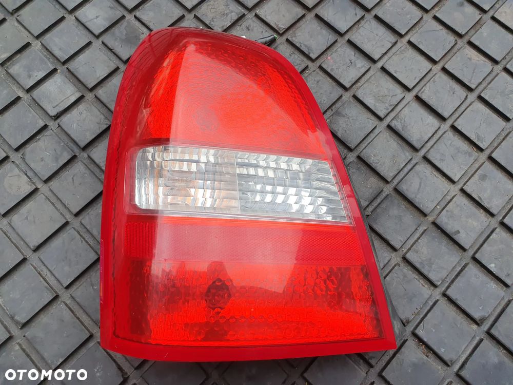 NISSAN PRIMERA III P12 SEDAN LAMPA TYŁ LEWA TYLNA EUROPA - 1
