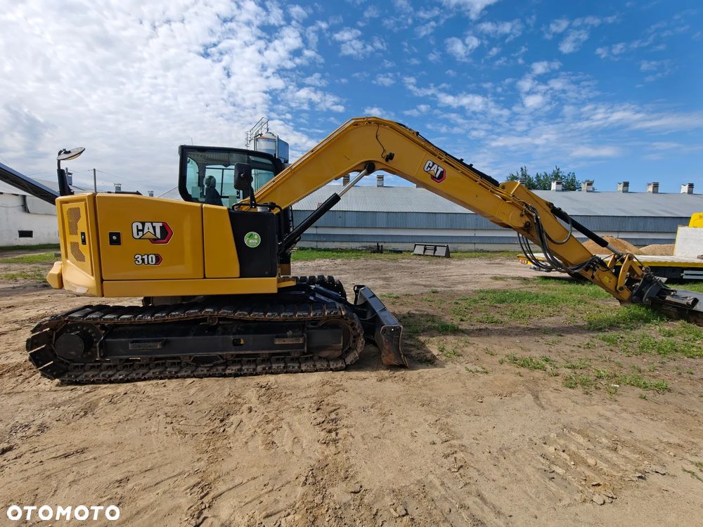 Caterpillar 310 - 1