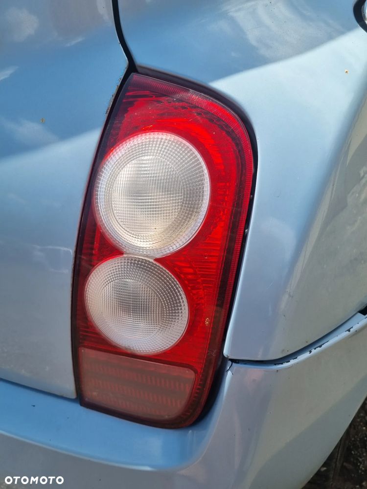NISSAN MICRA III K12 03-07 2005 r. 5D HB lampa prawy tył prawa PT EU * - 4