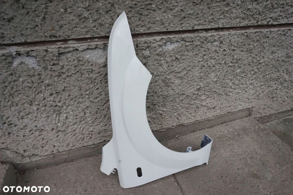 BŁOTNIK PRAWY FOCUS II MK2 DIAMOND WHITE N3 04/08r - 2