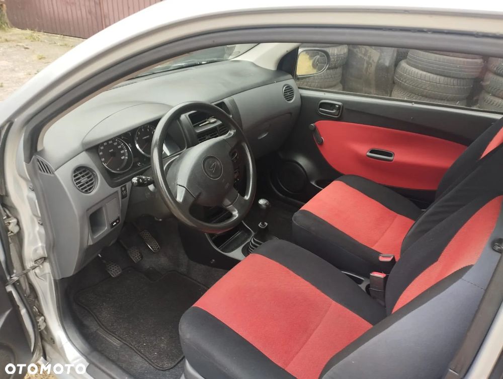 Daihatsu Cuore 1.0 Plus - 4