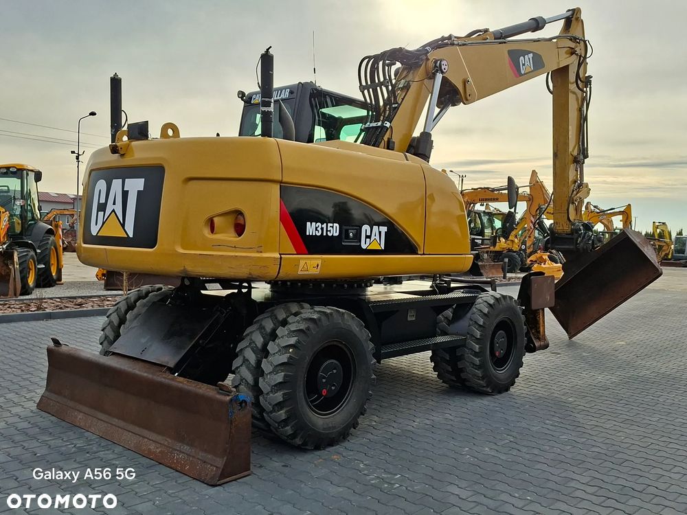 Caterpillar CAT M315D rok 2012 - 16