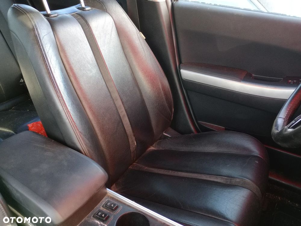 Fotele przód/tył Mazda CX7 konsola, kierownica, boczki dużo częśći - 6