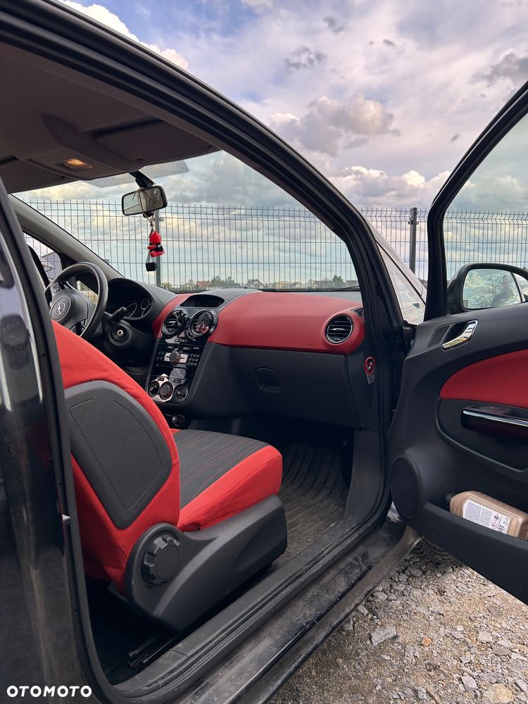 Opel Corsa 1.2 16V Cosmo - 8