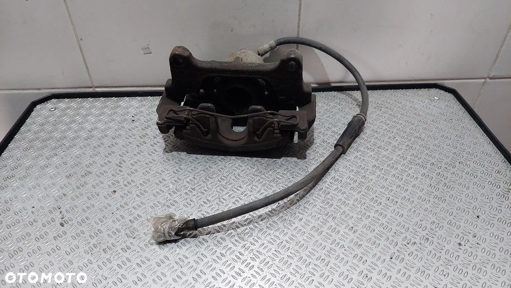 ZACISK HAMULCOWY PRAWY PRZÓD VW PASSAT B7 2,0 TDI R2013 - 3