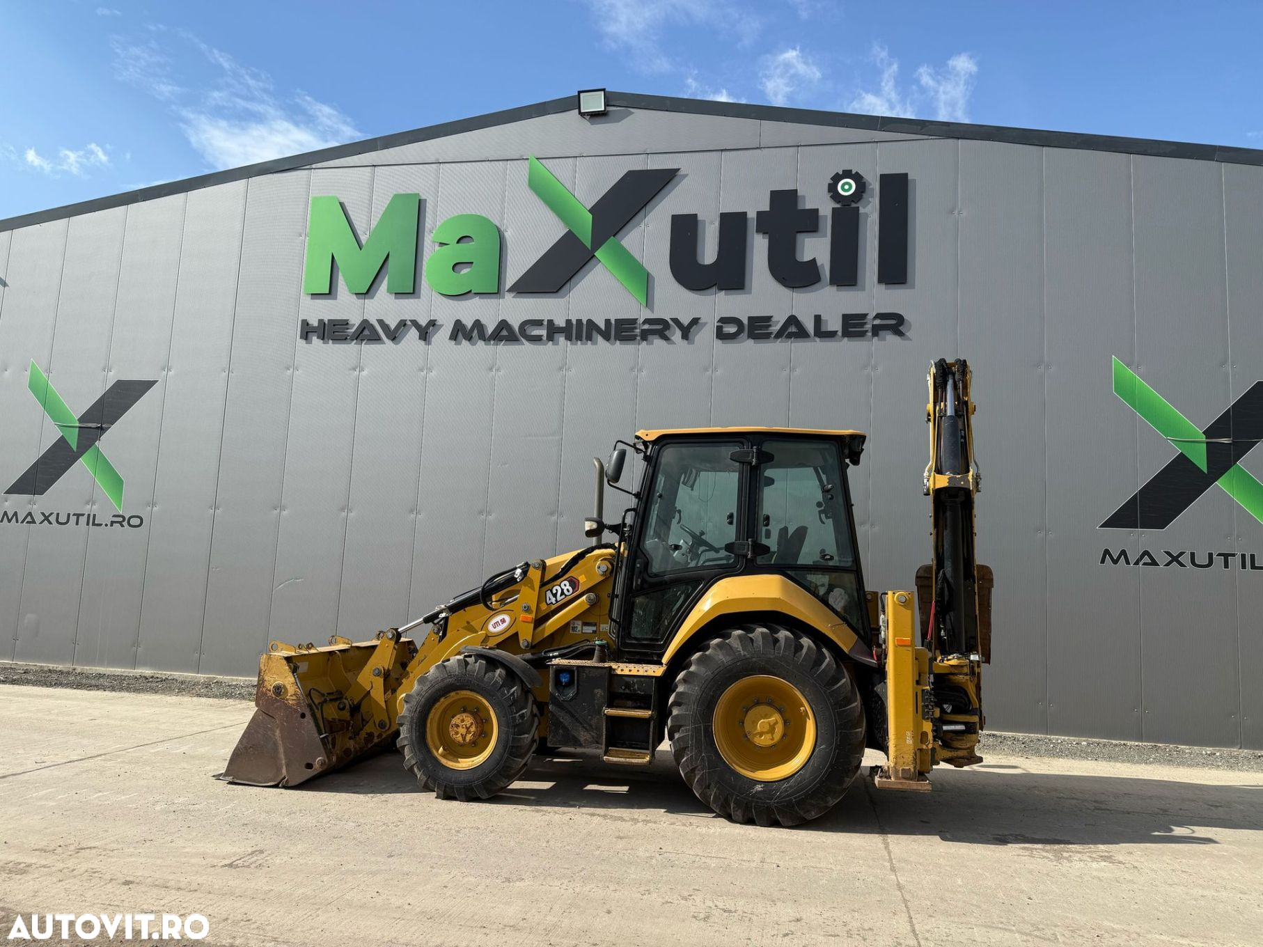 Cat 428 Buldoexcavator - 2