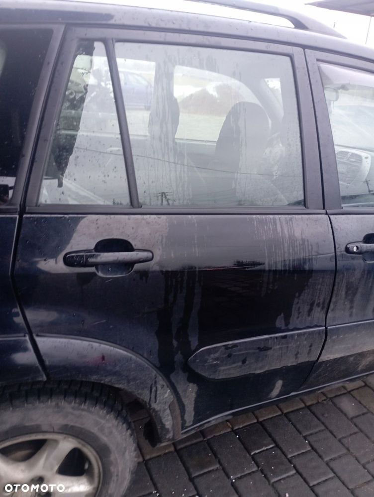 TOYOTA RAV4 II 5D DRZWI PRAWE TYŁ TYLNE GOŁE 202 - 1