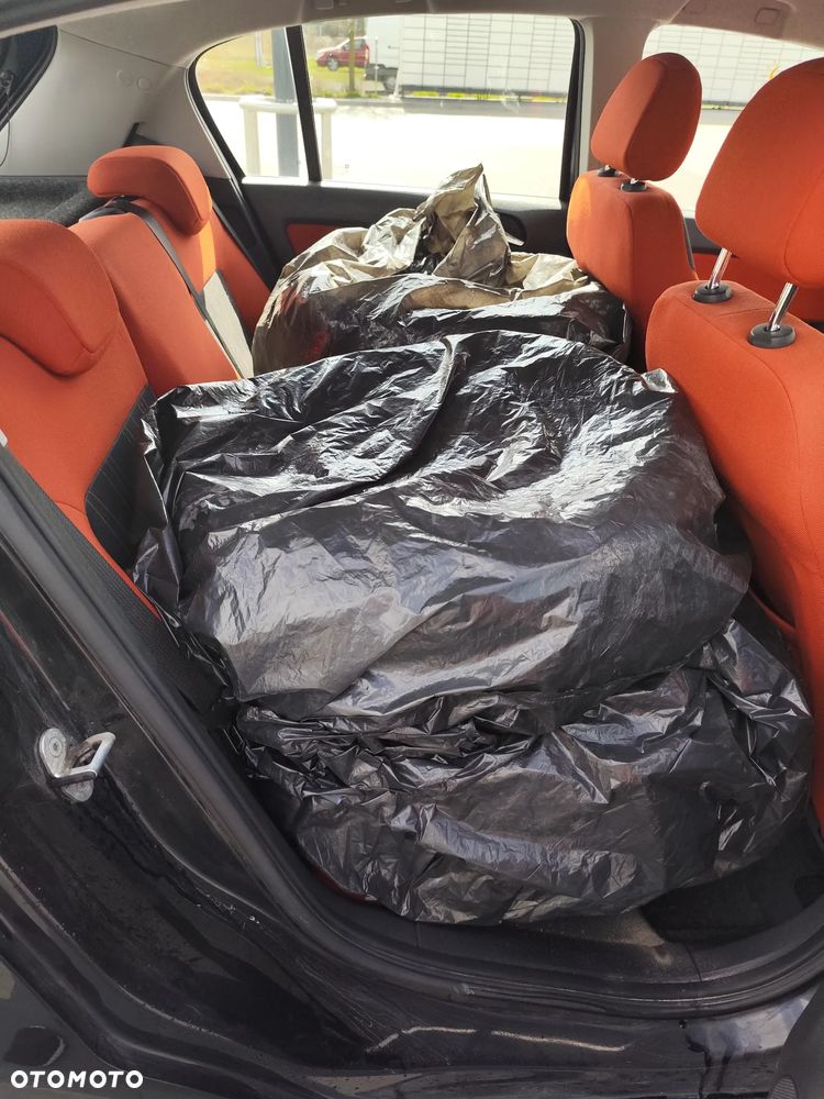 Opel Corsa 1.4 16V Cosmo - 11