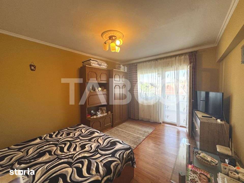 COMISION 0 - Apartament cu 4 camere 2 bai pivnta si balcon Cisnadie — fotografia 3
