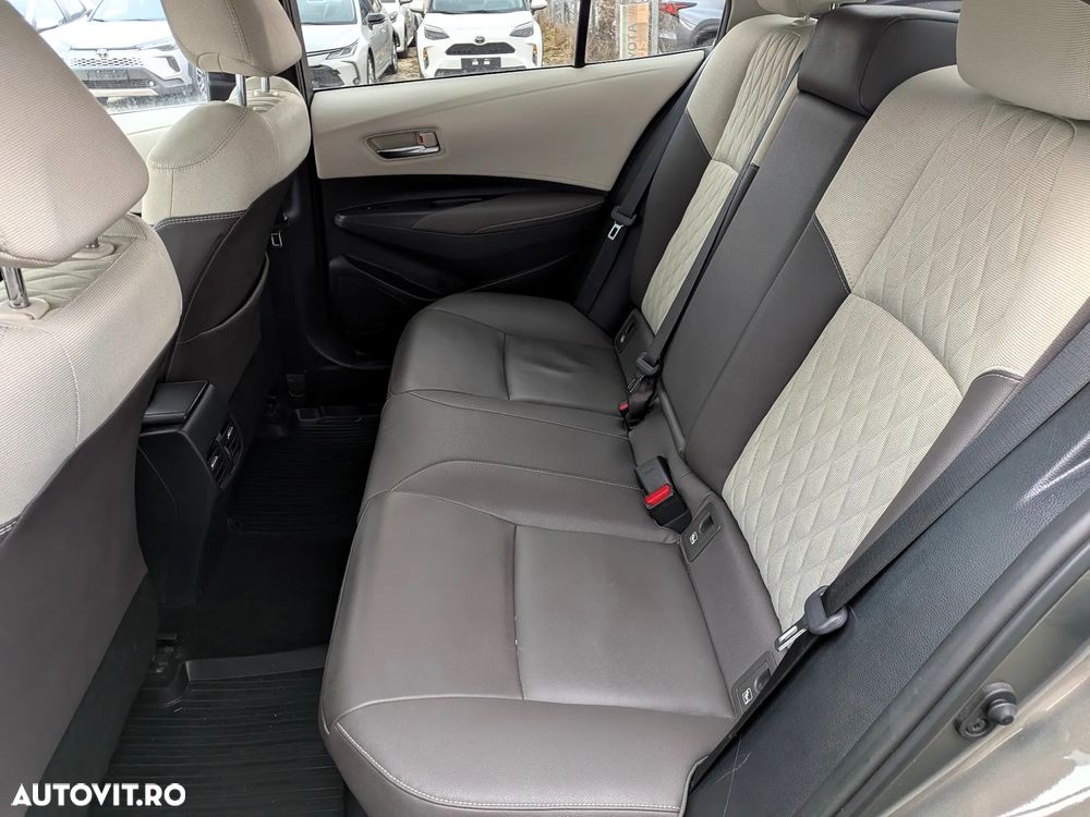 Toyota Corolla 1.8 HSD Exclusive Plus tapiterie Gri - 11