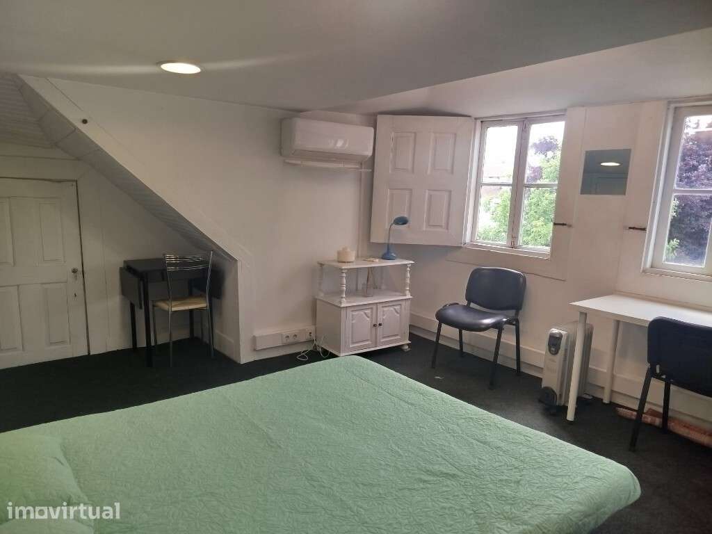 Quarto em moradia - último piso a 250 m da Universidade - Grande imagem: 5/10