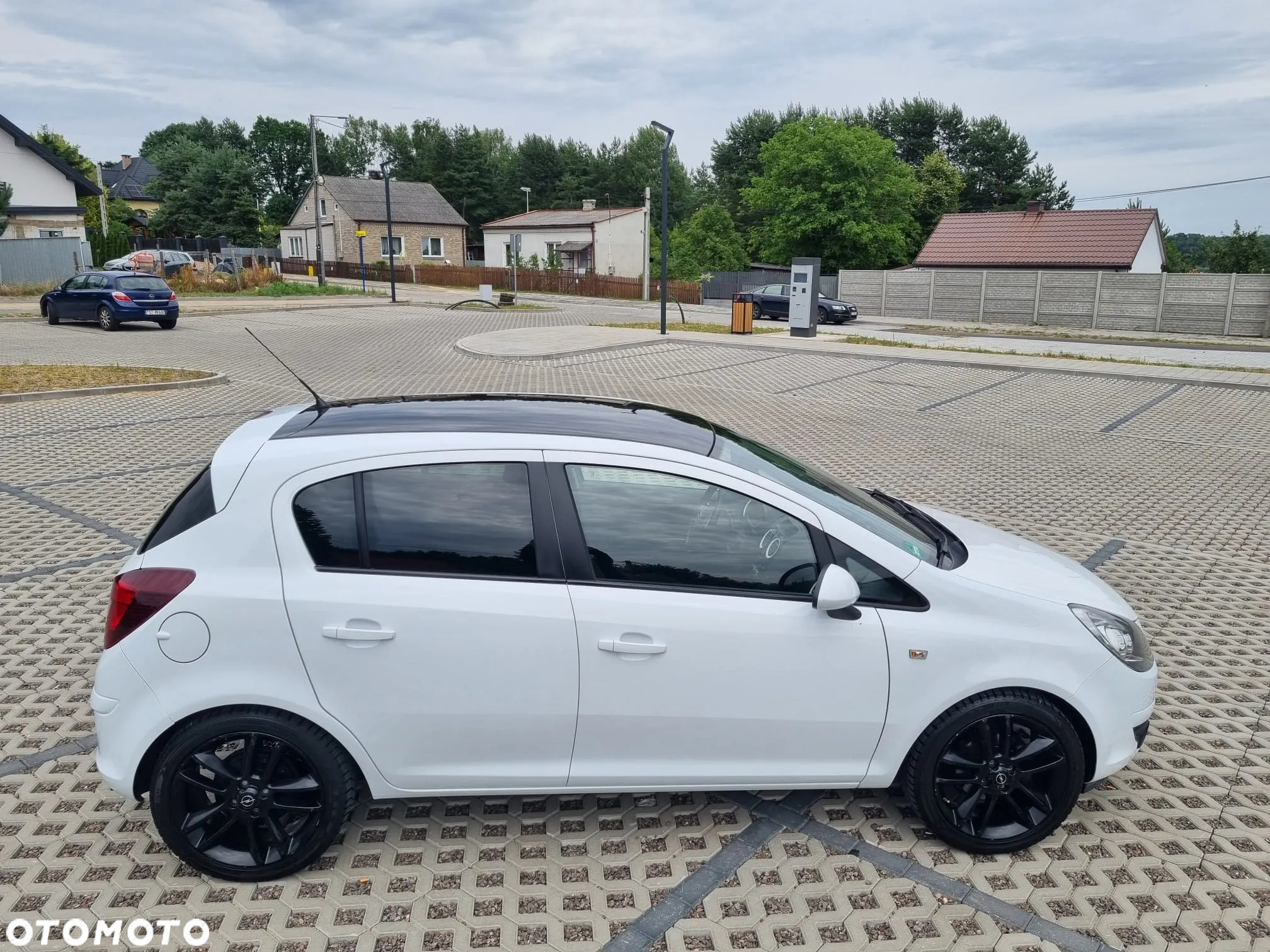 Opel Corsa 1.4 16V Cosmo - 19