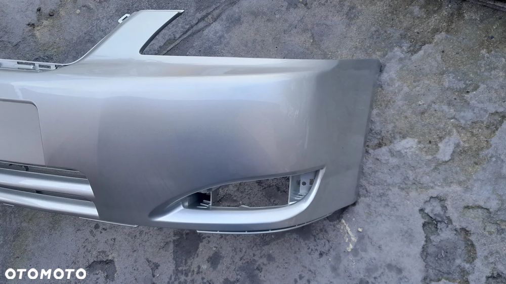 Toyota Corolla E12 02-04 rok zderzak przedni hatchback  kod lakieru 1C0 - 2