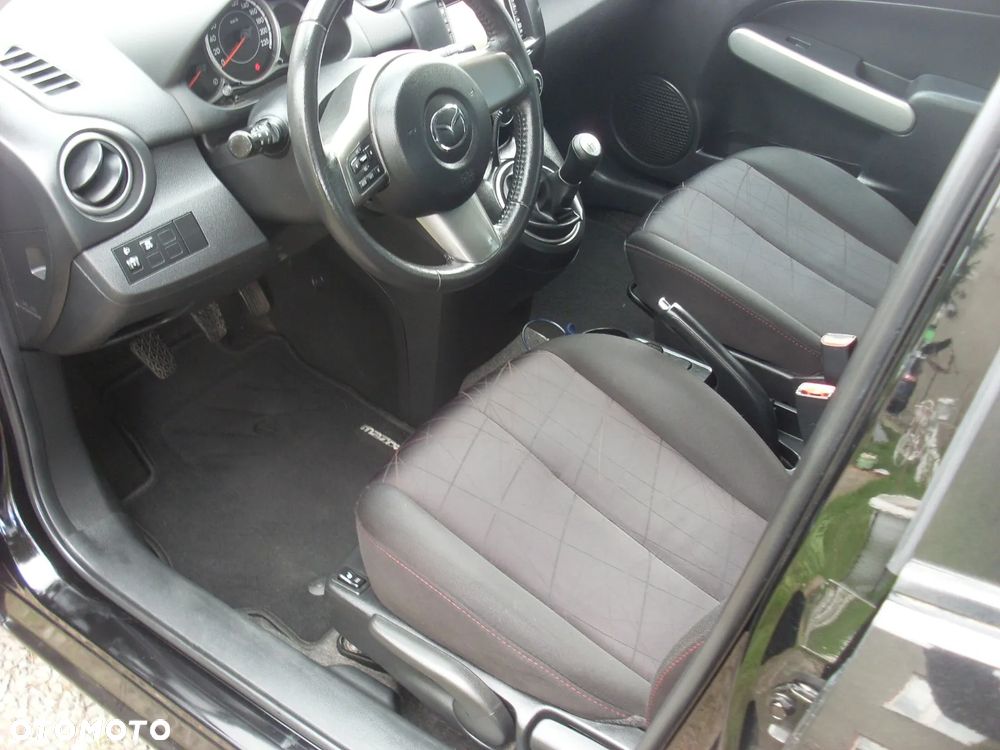 Mazda 2 1.3 Navi + - 7