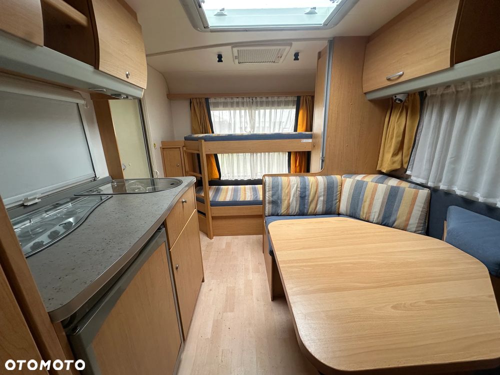 KNAUS 500 SUDWIND z przedsionkiem, napędem i łóżkami piętrowymi. - 38