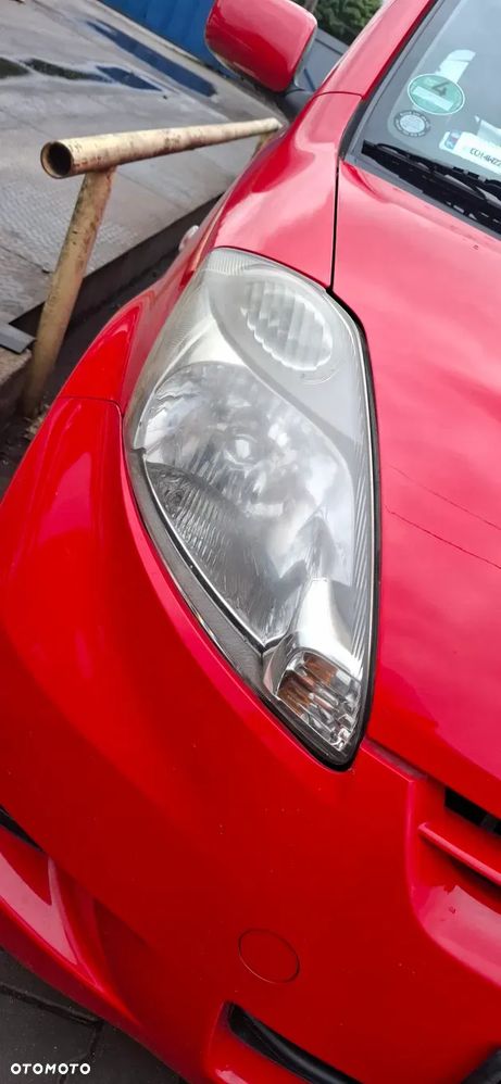 DAIHATSU SIRION lampa prawa przednia  98-02r - 1