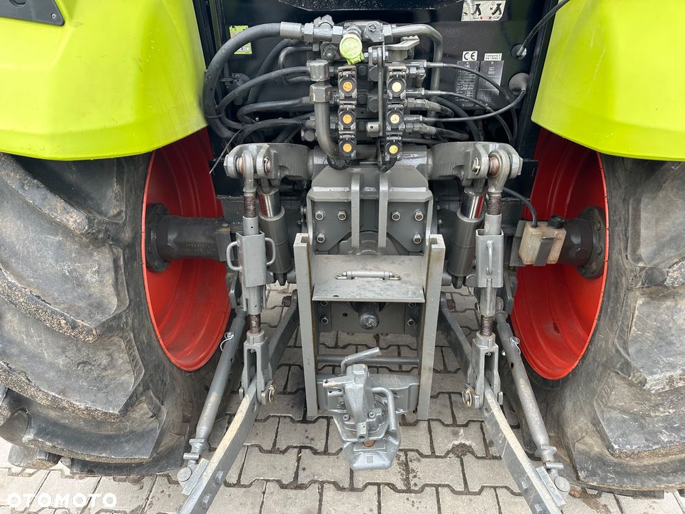 Claas Axos 320 - 11