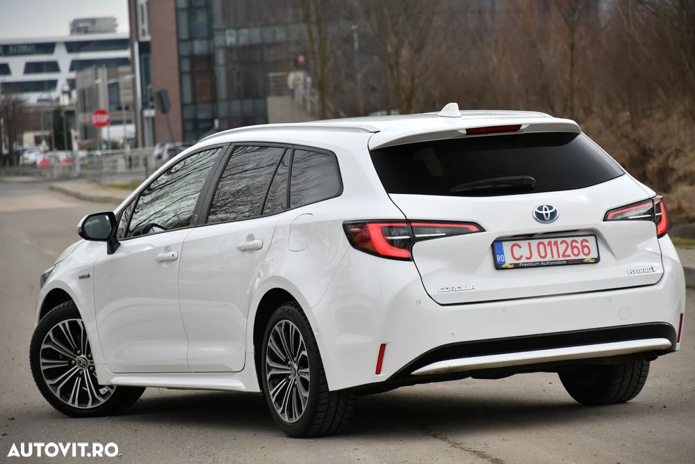 Toyota Corolla 1.8 HSD Exclusive - 19