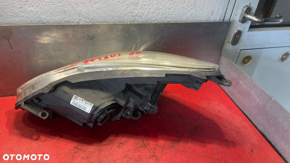 REFLEKTOR LAMPA PRAWY OPEL CORSA D LIFT ORYGINAŁ EUROPA - 7