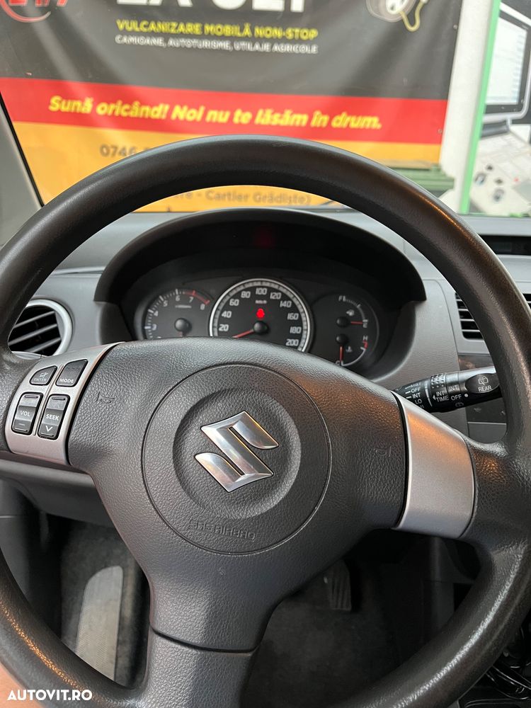 Suzuki Swift 1.3 GLX - 11