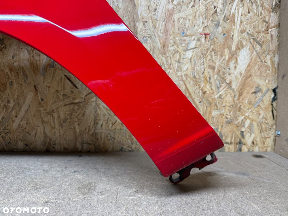 BŁOTNIK LEWY PRZÓD LEWY PRZEDNI OPEL CORSA E CZERWONY 50B - 28