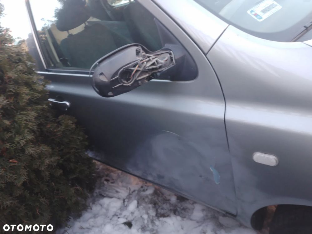 NISSAN MICRA K12 03-07 1.2 16V  LUSTERKO ZEWNĘTRZNE LEWE   KY0 G - 9