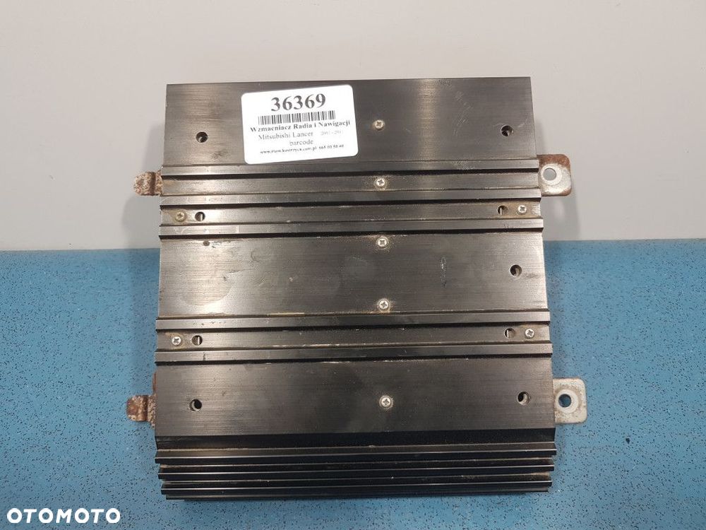 MITSUBISHI LANCER VII WZMACNIACZ RADIA 8701a279 - 1