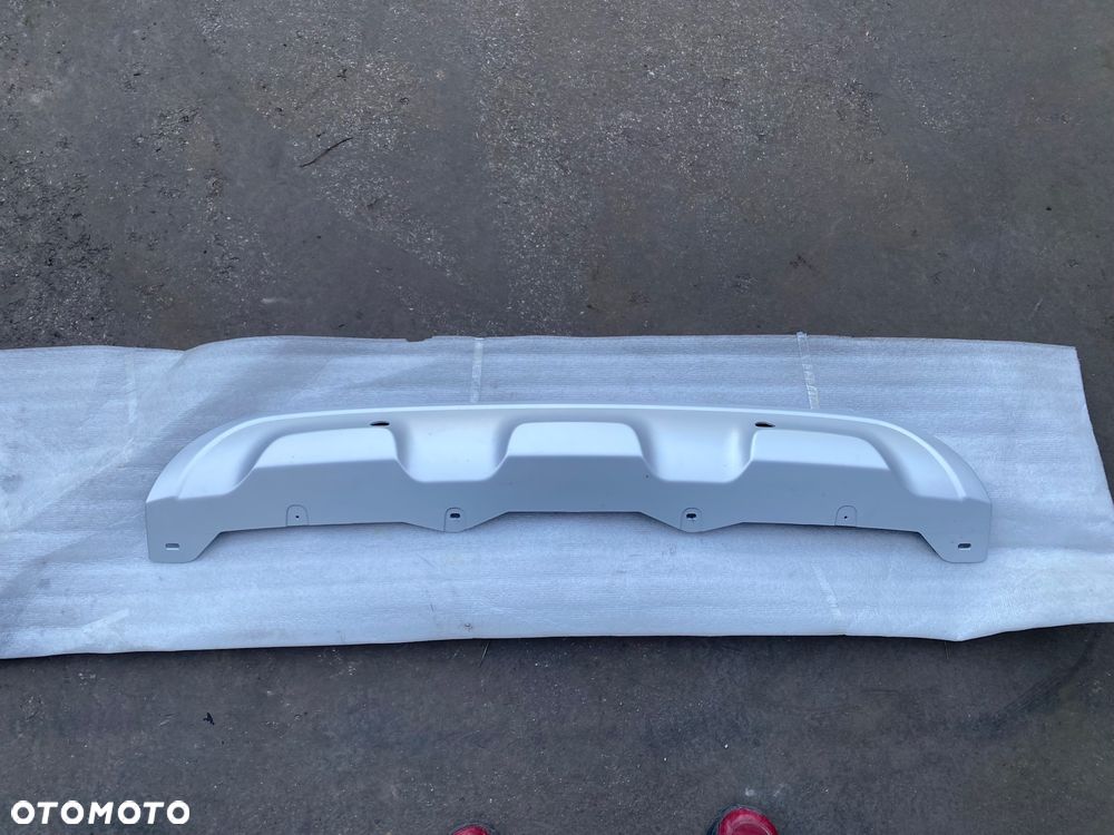 RENAULT CAPTUR 1 I lift 17-> Nowa Oryginalna Dolna DOKŁADKA NAKŁADKA SPOILER LISTWA DYFUZOR ZDERZAKA TYLNEGO TYŁ W ZDERZAK TYLNY otwory na PDC  82015-78573   82015-91868  Wwa - 9