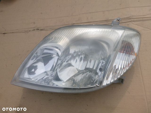 LAMPA LEWY PRZÓD LEWA PRZEDNIA TOYOTA COROLLA E12 01- - 13