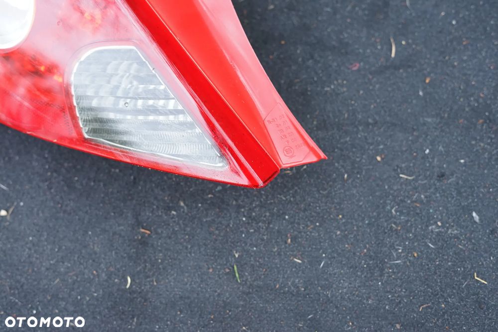 Lampa tył tylna lewa Opel Corsa D 3d 13211840 - 2