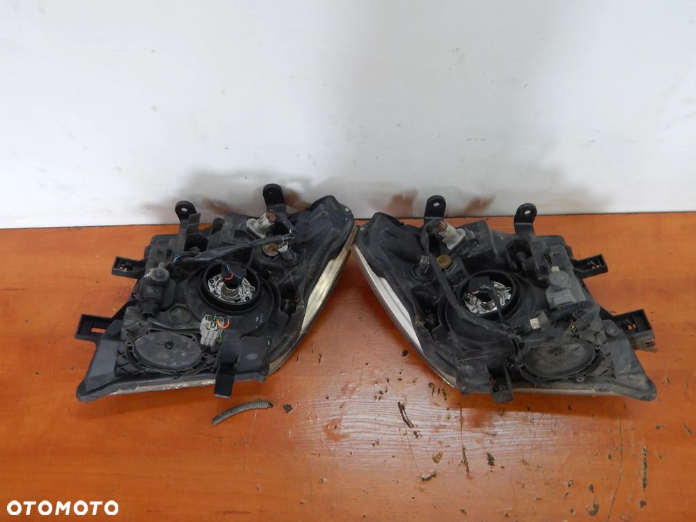Lampa przód przednia Nissan Navara D40 Pahfinder R51 05-14 zwykła Łuków części - 6