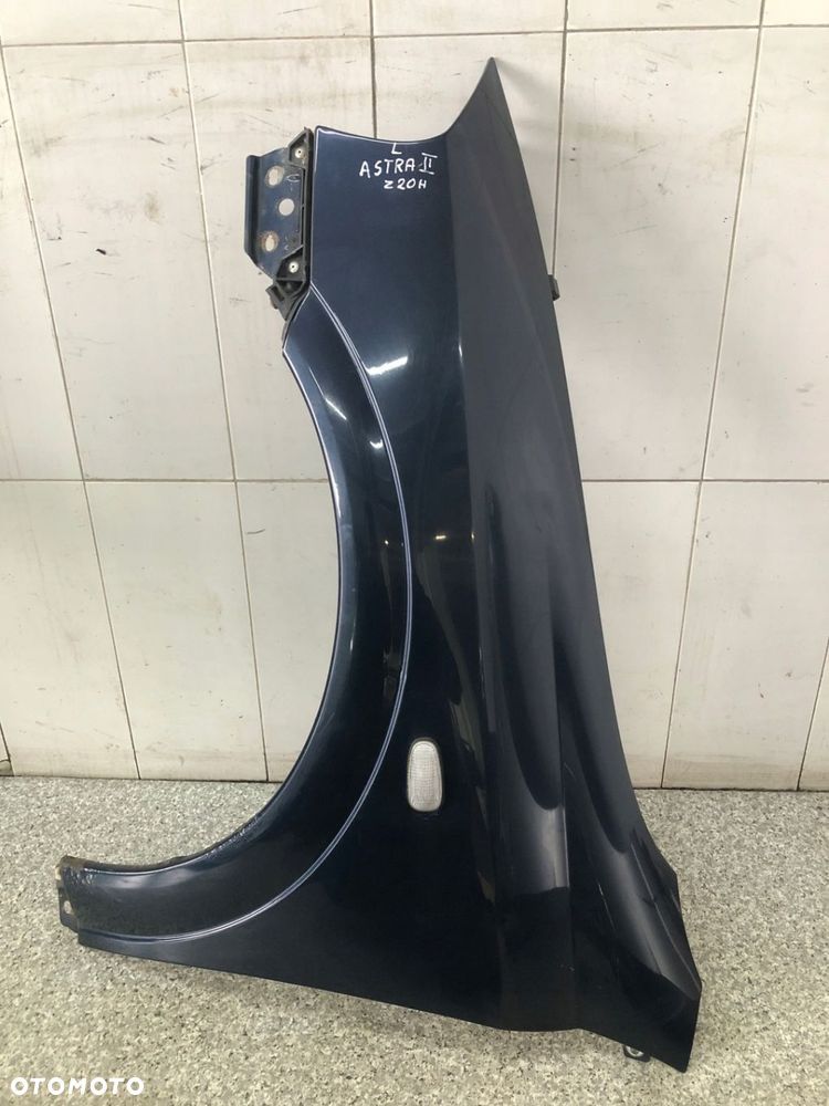 BŁOTNIK PRZEDNI LEWY OPEL ASTRA II Z20H - 1