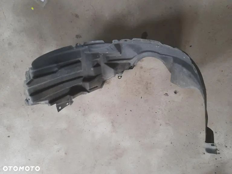 nadkole lewe przód Daihatsu Sirion II Subaru Justy IV 53876-B1020 - 2