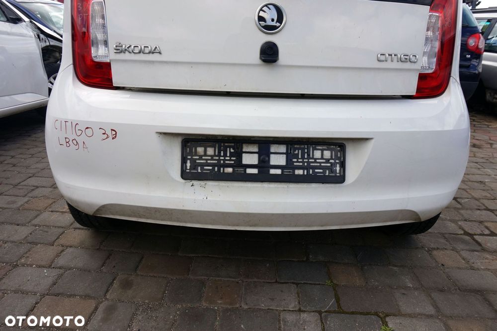 ZDERZAK TYLNY CITIGO NF1 3D HB LB9A 1ST807421D BIAŁY SKODA 2011-2019 - 1