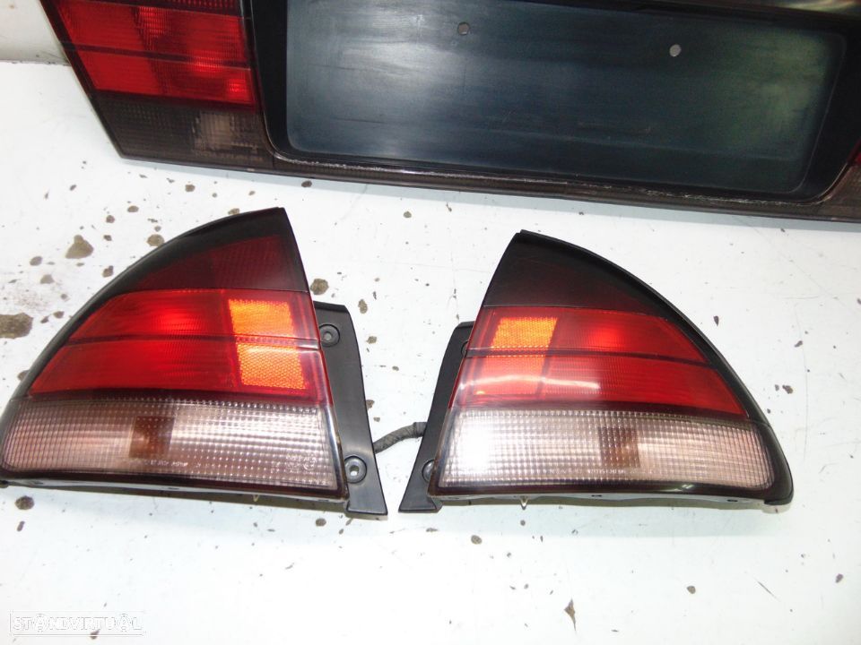 Toyota corolla xli farolins /Placa central - 7