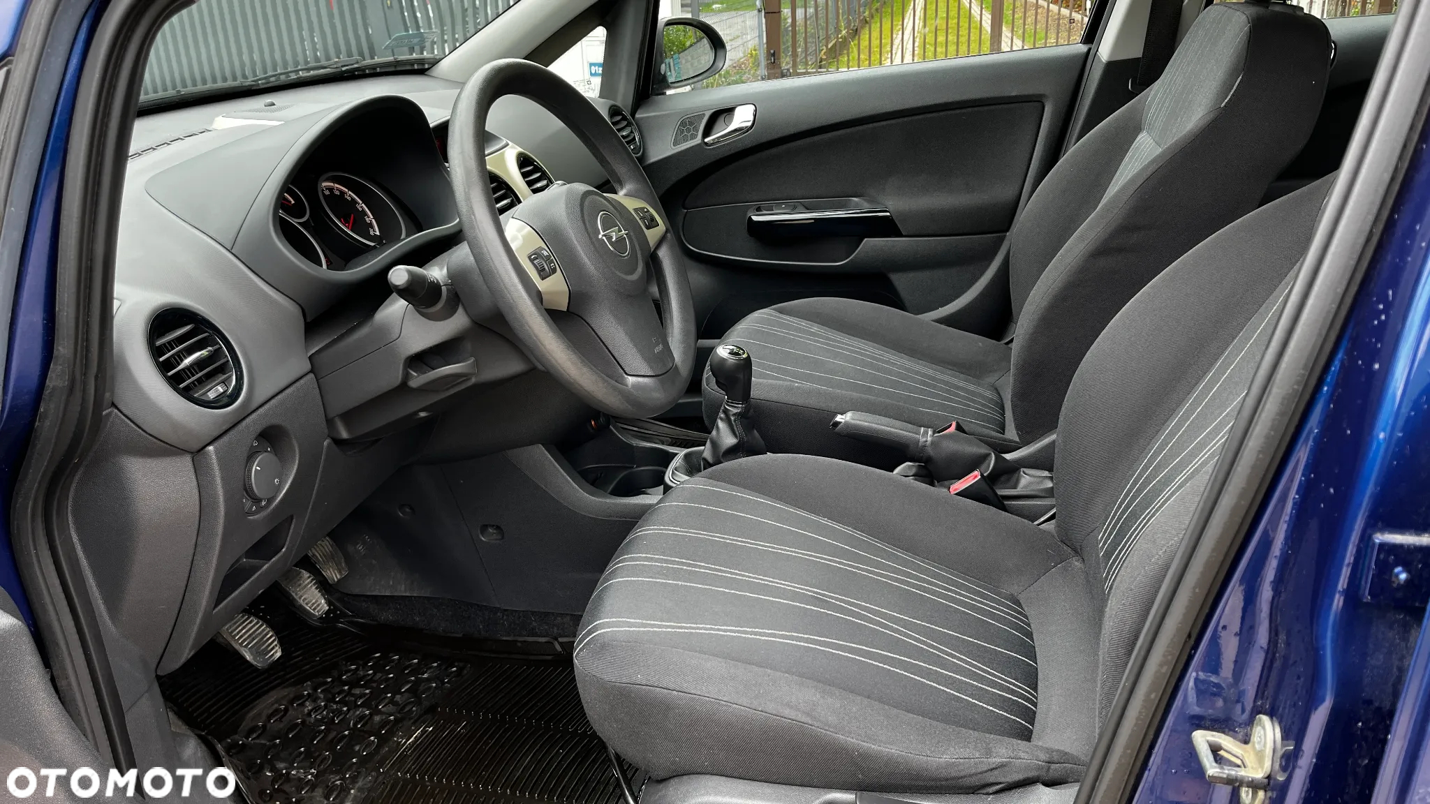 Opel Corsa 1.2 16V Enjoy - 11