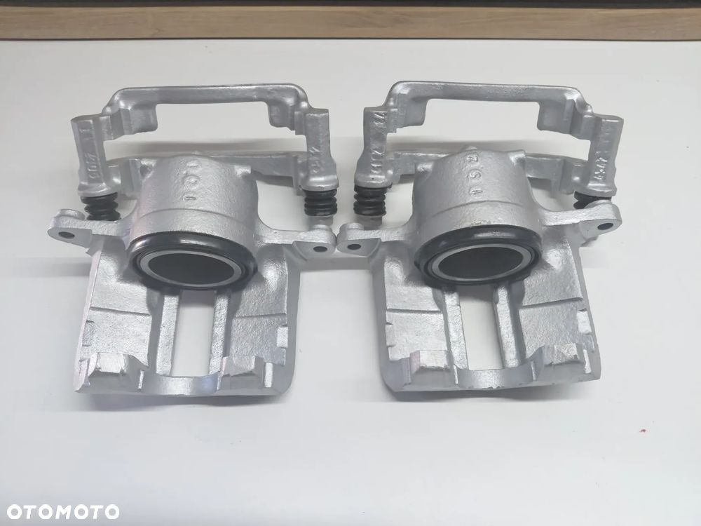 zacisk skoda favorit felicia I  II  przód lewy prawy oryginał - 3