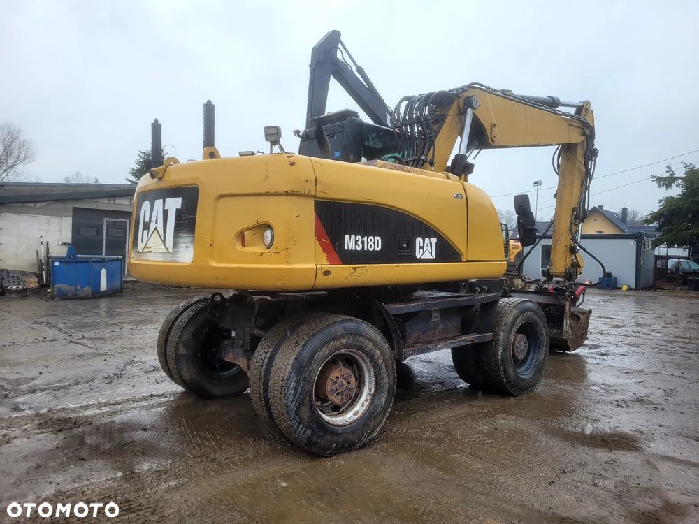 Caterpillar M318D - 3
