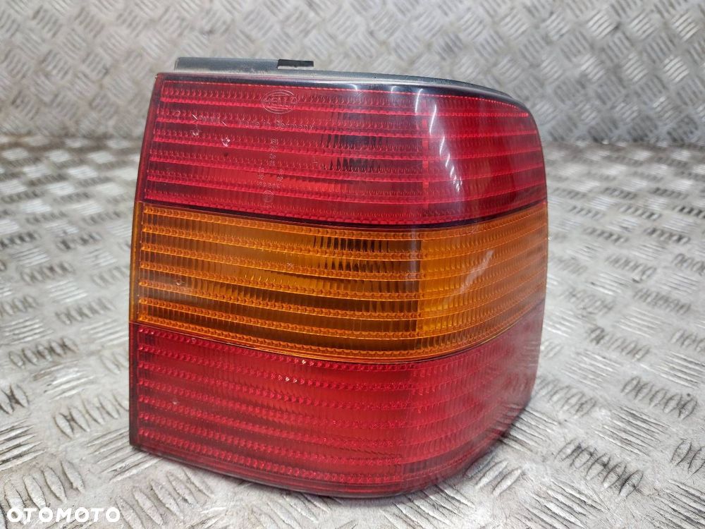 LAMPA PRAWY TYŁ HELLA VOLKSWAGEN PASSAT B4 SEDAN 3A5945112 - 1