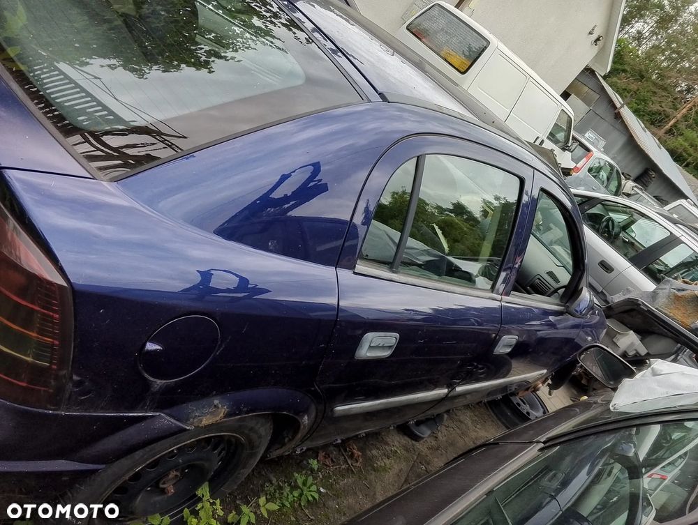 Opel Astra G (98-09r.) 1.4B 89KM. Silnik X14XE Skrzynia MG4 lakier Z282 / 13L / 13U. Cały na części. GWARANCJA !!! Przód Tył Zestaw Komplet Drzwi Klapa Zderzak Błotnik Maska Grill Atrapa Szyba Pas Lampa Lusterko Boczki Fotel Kanapa Kokpit Deska Rozdzielcza Przełącznik Włącznik Sterownik Przewody Wiązka Instalacja Moduł Komputer Czujnik Listwa Pompa Alternator Wtryski Głowica Rozrusznik Kompresor Sprzęgło Dwumas Silnik Skrzynia ABS Klimatyzacji Paliwa Wspomagania Kolektor Turbina Przepustnica Zawór Chłodnica Koło Hak Belka Sanki Zawieszenie Mcpherson Półoś Amortyzator Wydech Tłumik Zacisk Most - 5