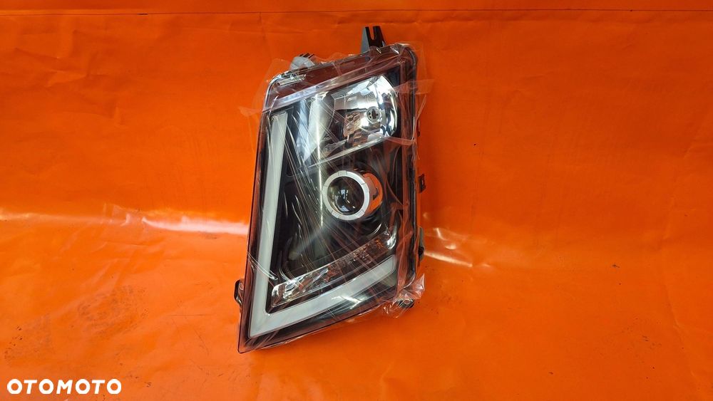 VOLVO FH4 REFLEKTOR LAMPA LEWA XENON CZARNY -NOWA! - 1