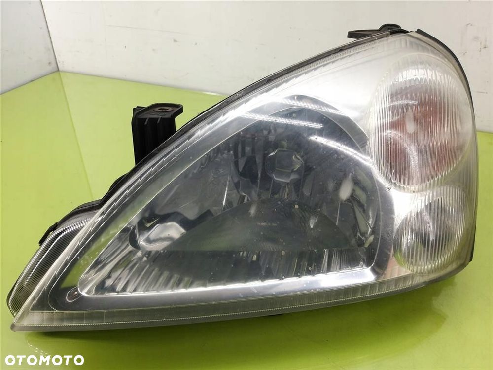Reflektor lampa przód lewa Suzuki Liana 2001–2010 KOITO 10032662 - 1