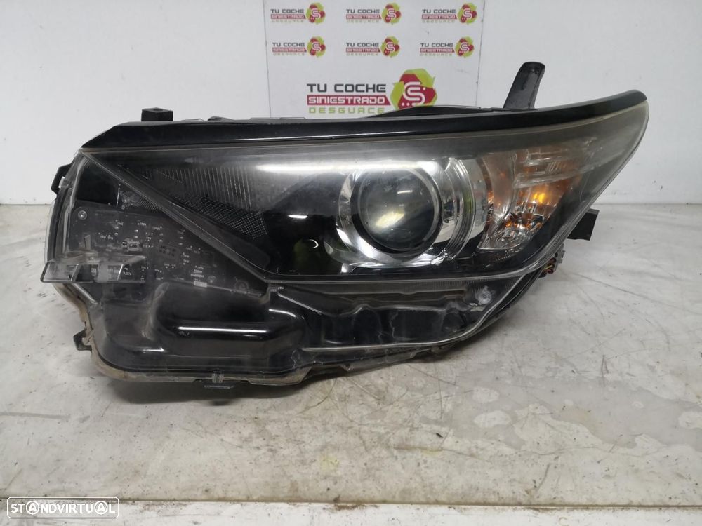 FAROL ESQUERDO TOYOTA AURIS TOURING SPORTS E18 - 1