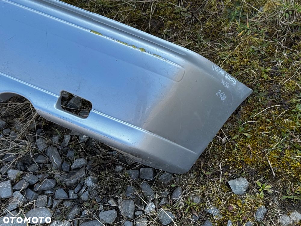 ZDERZAK TYLNY NISSAN	ALMERA N15	1996-1998	OE UŻYWANY	85022-0N000 - 3