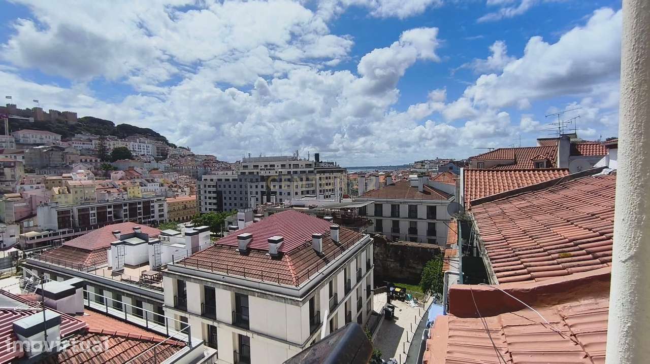 Apartamento com História e Vista Infinita na Baixa Pombalina em Lisboa - Grande imagem: 5/12