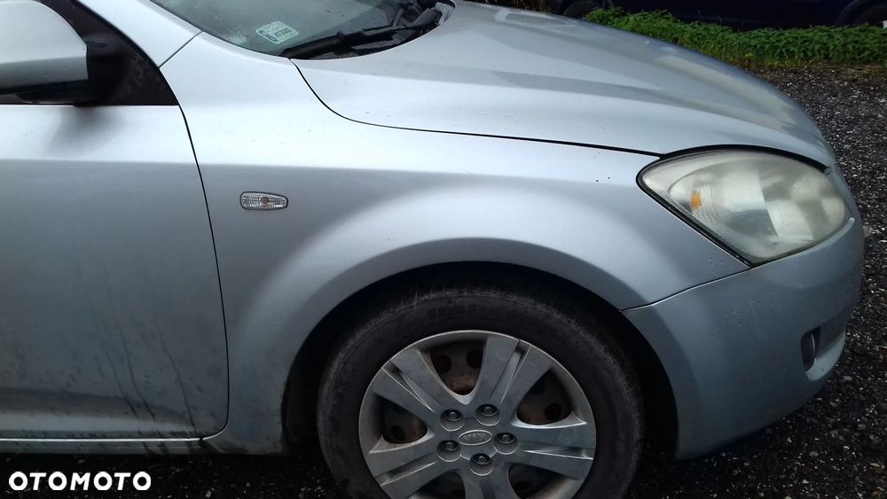BŁOTNIK PRAWY PRZÓD PRZEDNI KIA CEED I 06- 9S